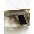 Finat 6.36 -.25 ACP shell in clear resin cast. Display Item