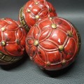 Three Highly Decorative Lacquered Wood Balls