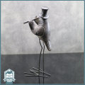 Large Cast Resin and Metal Feet Bird Flute Player!!!