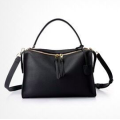 Genuine leather famous design ladies handbag, with strape. black color.