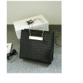 Crocodile pattern stereotyped fashion steel handle handbag. Grey color.