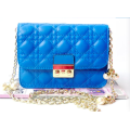 Genuine leather classic dating handbag, chain with pearls. Blue color. Stock in ZA