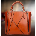Elegant and beautiful ladies handbag with strape. Brown color.
