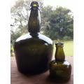 Dark green 1900`s liquor bottle with matching miniature.