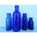 Vintage Cobalt blue milk of magnesia bottles