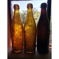 Three South African beer bottles