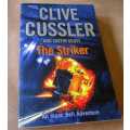 THE STRIKER - CLIVE CUSSLER AND JUSTIN SCOTT - AN ISAAC BELL ADVENTURE