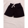 Black PT shorts 7-8 years
