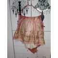 Stunning light pink lined and netted Indian outfit