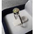 Genuine ETHIOPIAN OPAL SET IN SOLID STERLING with Nice Flashes