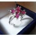 FLOWER STYLE RUBY RING SET IN SOLID STERLING