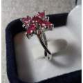 FLOWER STYLE RUBY RING SET IN SOLID STERLING