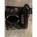 X BOX 360 E 500GB WITH 2 CONTROLLERS and 2 GAMES