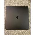 PLAYSTATION SLIM 1 TB WITH 2 CONTROLLERS and 1 GAME