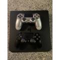 PLAYSTATION SLIM 1 TB WITH 2 CONTROLLERS and 1 GAME