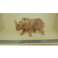 `Rhino On The Move` - Rhinoceros Sculpture Hand Carved From Zimbabwe Iron Wood.
