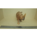 `Rhino On The Move` - Rhinoceros Sculpture Hand Carved From Zimbabwe Iron Wood.