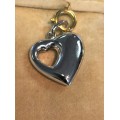 9K   solid  9 carat White Gold - Imported Large Puffed Heart pendant, with heart cutout