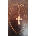 Lovely 9 Carat `Gold Cross and Chain` with small Diamond.