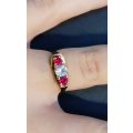 RUBY and SAPPHIRE 9CT Yellow Gold Dress Ring.