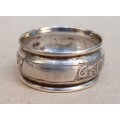 Sterling silver napkin ring...vacant cartouche....diameter 4cms...width 2 cms