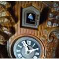 Unusual cuckoo clock, keeps time and cuckoo has pleasant dulcet tone