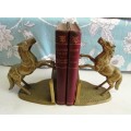 Solid Brass Book Ends. Equestrian, reared up jumping fence. Approximately 17 high x 14 cms long