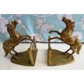 Solid Brass Book Ends. Equestrian, reared up jumping fence. Approximately 17 high x 14 cms long