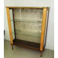 Glass Display Cabinet Circa 1960. Glass shelving. Approximately 90l x 30w x 110 cms high