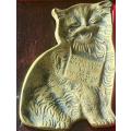 A lovely vintage brass flat cat ashtray with and embellished sign `Some people drop their H`s others