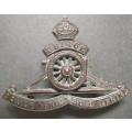 SOUTH AFRICA ARTILLERY CAP BADGE WITH TURNING WHEEL - LUGS INTACT