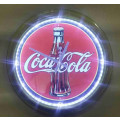 Coca-cola illuminated clock.
