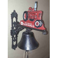 Farmall cast iron wall mounted bell.