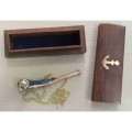 Nautical Boatswain Whistle in a wooden box.