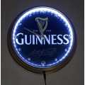 Guinness illuminated metal clock. 31cm diameter.