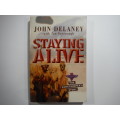 Staying Alive: John Delaney with Jan Greenough (Signed copy)
