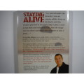 Staying Alive: John Delaney with Jan Greenough (Signed copy)