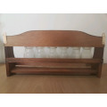 Spice rack with glass bottles