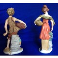 Pair of Leonardo Collection Bisque Porcelain Figurines