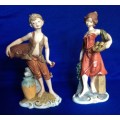 Pair of Leonardo Collection Bisque Porcelain Figurines