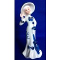 Set of Four Blue and White Porcelain Figurines - Small