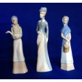 Set of Three Porcelain Figurines in Pastel Tones