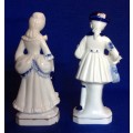 Matching Pair of Blue and White Porcelain Figurines