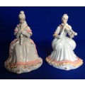 Matching Pair of Small Porcelain Musician figurines