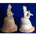 Matching Pair of Small Porcelain Musician figurines