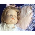 Sleeping Baby Porcelain Doll on Heart Shaped Pillow