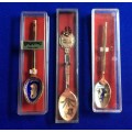 Gilt collectible spoons, Hong Kong and Singapore x 3