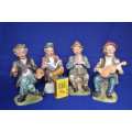 Set of Four Bisque Porcelain Figures