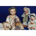 Boy with Dog Porcelain Group plus  Three Small Porcelain Figurines