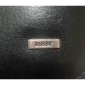 BLACK BUSBY LEATHER A4 FOLDER IN EXCELLENT CONDITION, EMBOSSED WITH PLAVIX LOGO ON INSIDE OF FOLDER